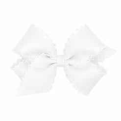 The Yellow Lamb Medium Monotone Moonstitch Bow In White